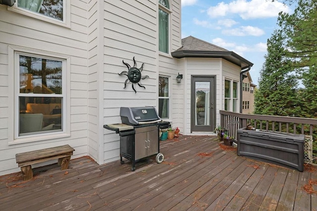 wooden terrace with grilling area