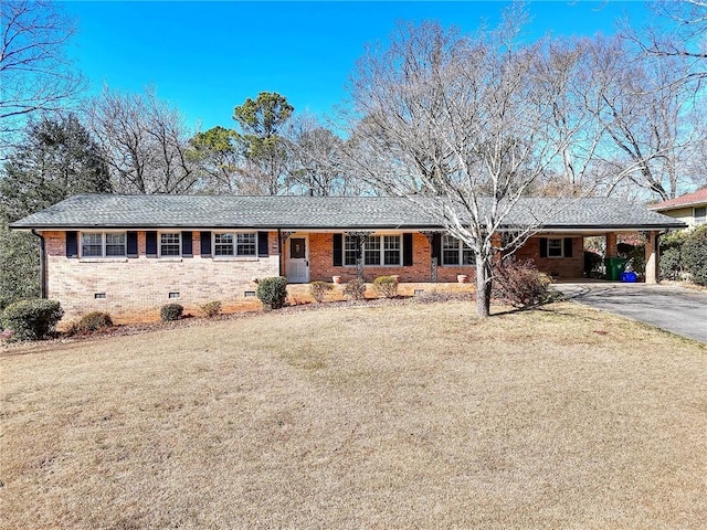 single story home featuring a front yard and a carport