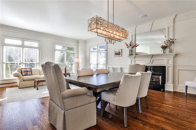 620 Elizabeth Oak Ct, Alpharetta, GA 30004 - dining room with a decorative wall, ornamental molding, dark wood-style floors, wainscoting, and a chandelier