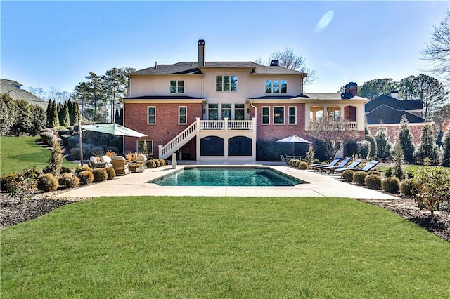 620 Elizabeth Oak Ct, Alpharetta, GA 30004 - back of property featuring a patio, an outdoor pool, a yard, and stairway