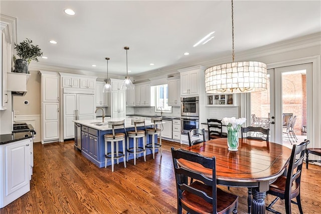 620 Elizabeth Oak Ct, Alpharetta, GA 30004 - dining area featuring dark wood-style floors, crown molding, wine cooler, and recessed lighting