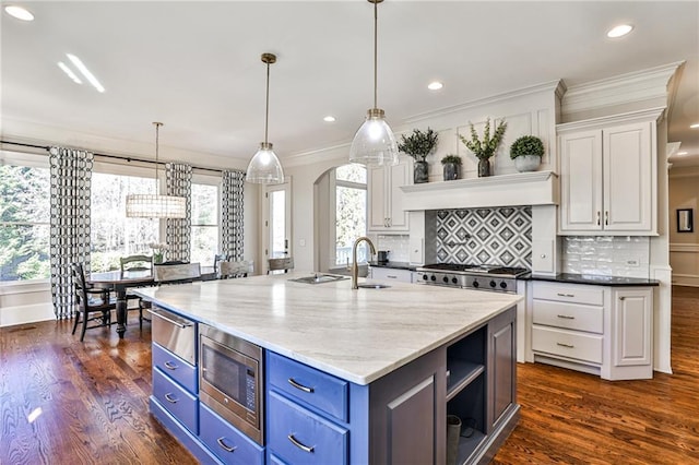 620 Elizabeth Oak Ct, Alpharetta, GA 30004 - kitchen featuring appliances with stainless steel finishes, a warming drawer, white cabinets, blue cabinets, and crown molding
