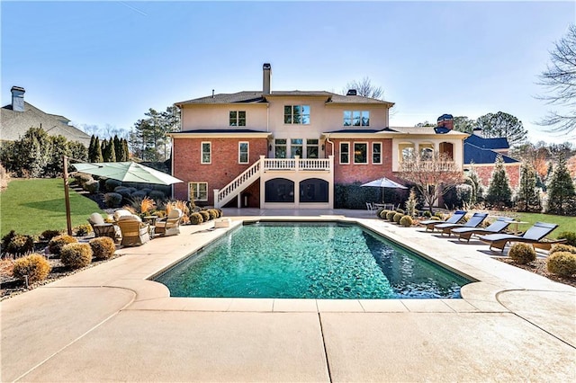620 Elizabeth Oak Ct, Alpharetta, GA 30004 - back of property featuring a patio, stairway, an outdoor pool, a chimney, and stucco siding