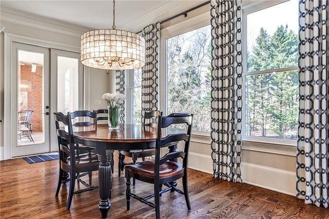 620 Elizabeth Oak Ct, Alpharetta, GA 30004 - dining area with dark wood-type flooring and crown molding