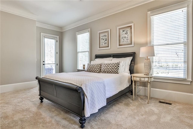620 Elizabeth Oak Ct, Alpharetta, GA 30004 - carpeted bedroom with ornamental molding and access to exterior