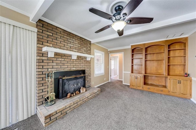 unfurnished living room featuring a fireplace, ornamental molding, ceiling fan, and light colored carpet