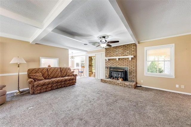 unfurnished living room with carpet floors, beam ceiling, a brick fireplace, a textured ceiling, and ceiling fan