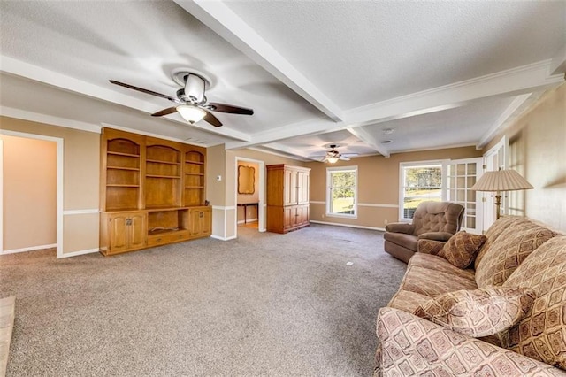 carpeted living room featuring beam ceiling, ceiling fan, and a textured ceiling