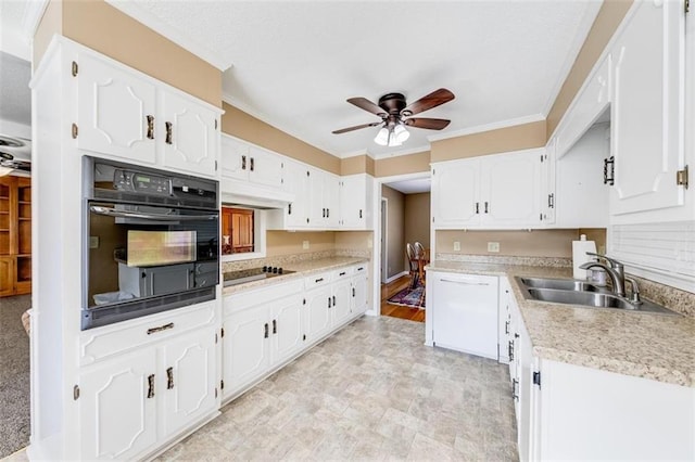 kitchen with ornamental molding, white cabinets, white dishwasher, sink, and black oven