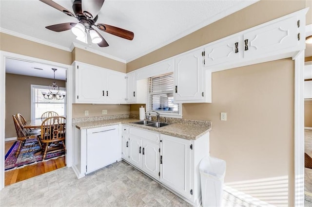 kitchen featuring ceiling fan with notable chandelier, crown molding, sink, light hardwood / wood-style flooring, and white cabinets