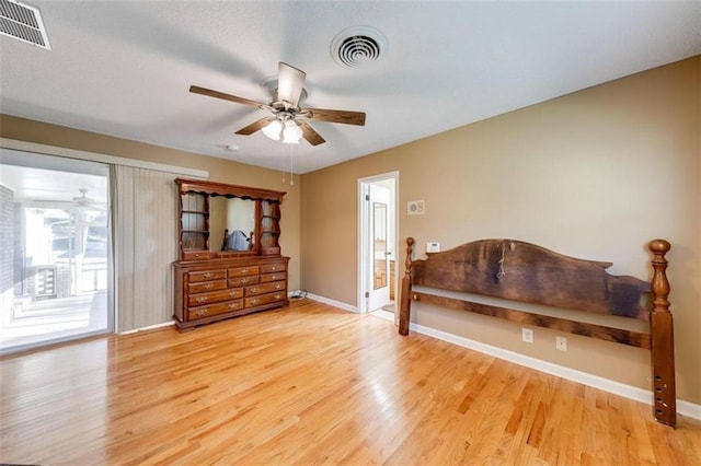 bedroom with access to outside, ceiling fan, and light wood-type flooring