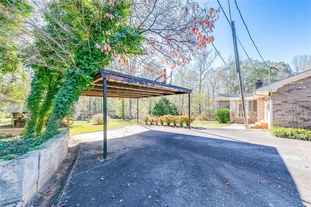 view of car parking with a carport