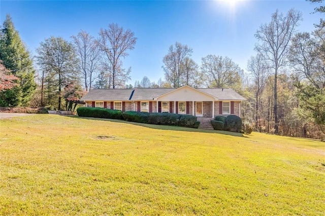 ranch-style house with a front yard