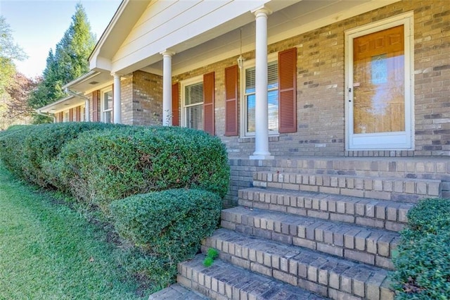 property entrance with covered porch