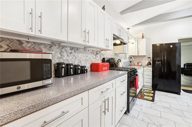 kitchen with marble finish floor, decorative backsplash, white cabinets, vaulted ceiling, and black appliances