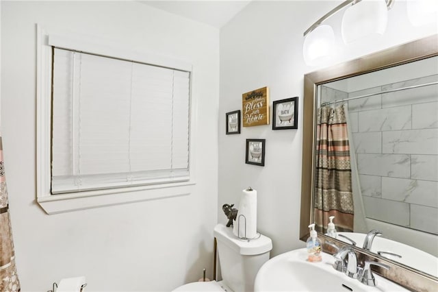 bathroom with a sink and toilet