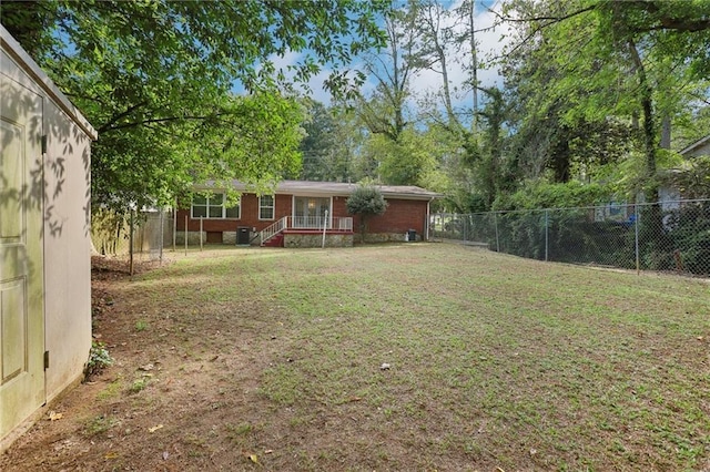 view of yard with a fenced backyard