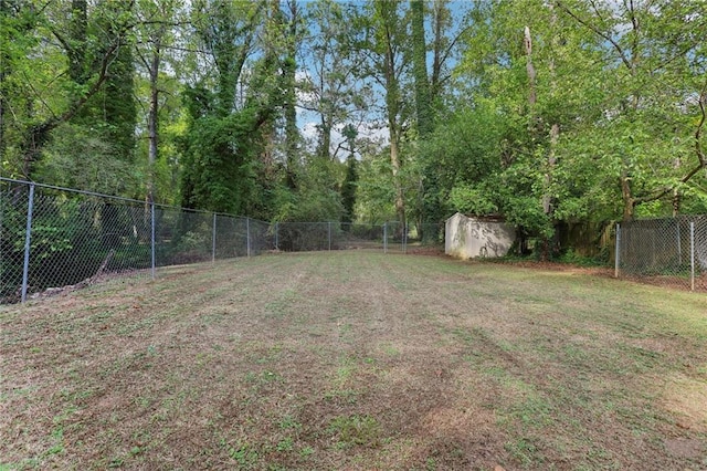 view of yard with a fenced backyard