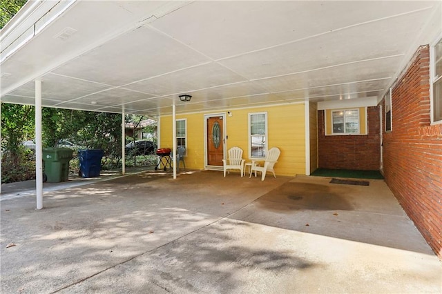 view of patio / terrace with a carport