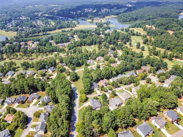 aerial view with a residential view and a water view
