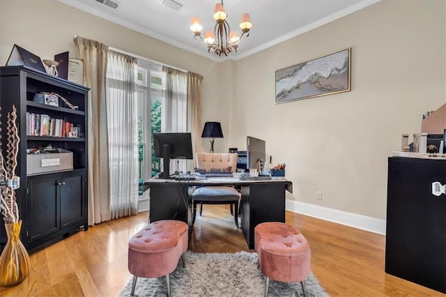 home office featuring baseboards, ornamental molding, wood finished floors, and a notable chandelier