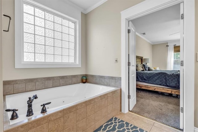 ensuite bathroom with tile patterned flooring, crown molding, visible vents, ensuite bathroom, and a bath