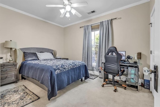 carpeted bedroom featuring a ceiling fan, ornamental molding, and visible vents