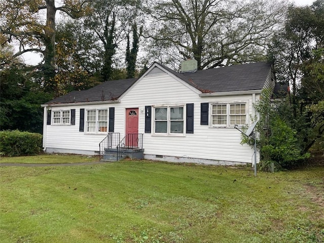 view of front facade with a front yard