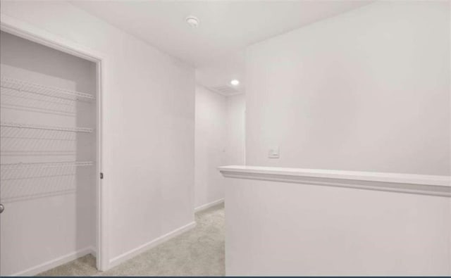 11408 Gray Branch Dr, Lawrenceville, GA 30045 - hall featuring light carpet, baseboards, and recessed lighting