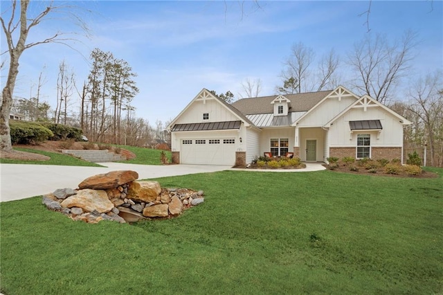 view of front facade with a garage and a front yard