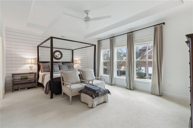 bedroom featuring light carpet and ceiling fan