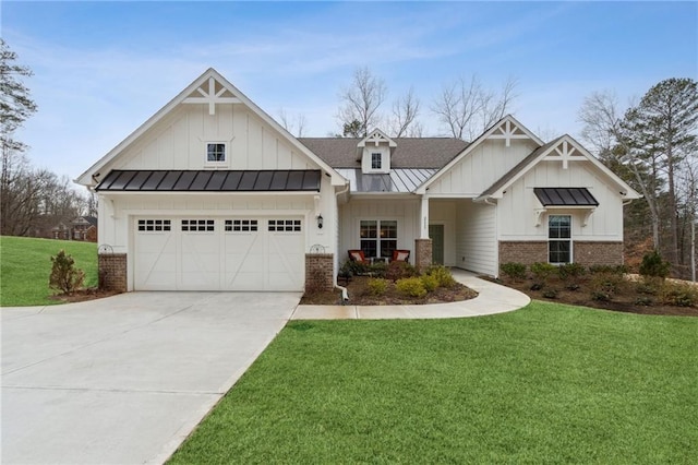 view of front of property with a garage and a front yard