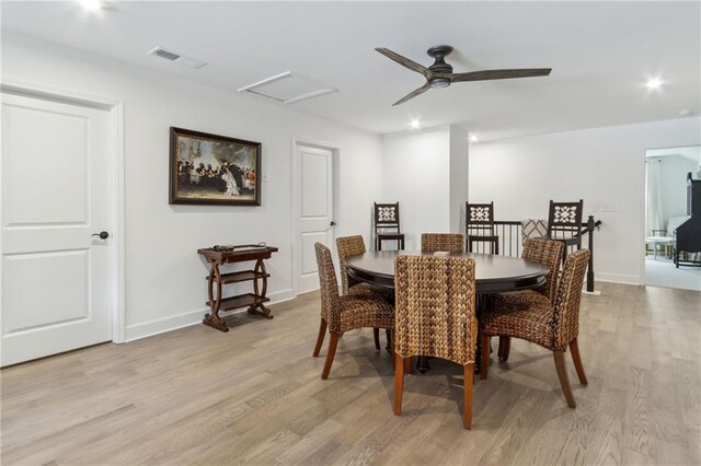 dining room featuring light hardwood / wood-style flooring and ceiling fan