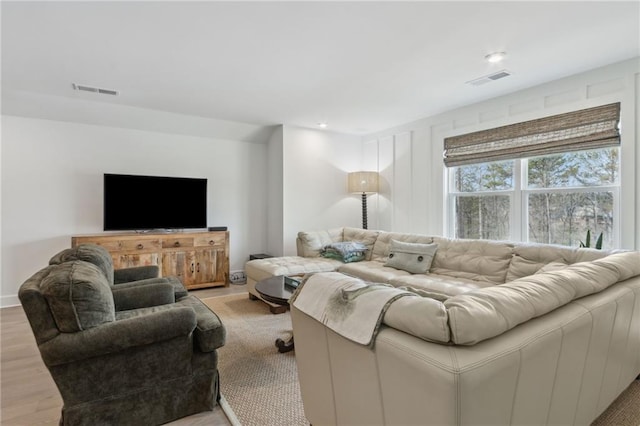 living room featuring light hardwood / wood-style floors