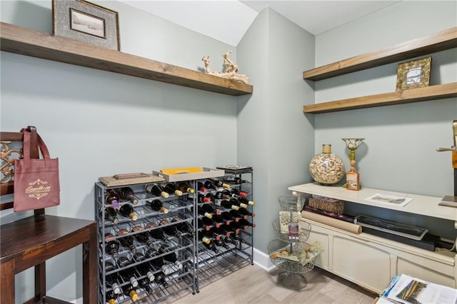 wine area featuring light hardwood / wood-style flooring