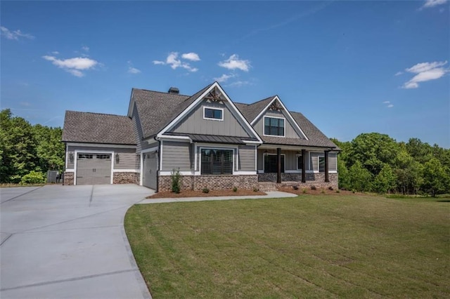 craftsman-style house with a front lawn, a garage, and a porch