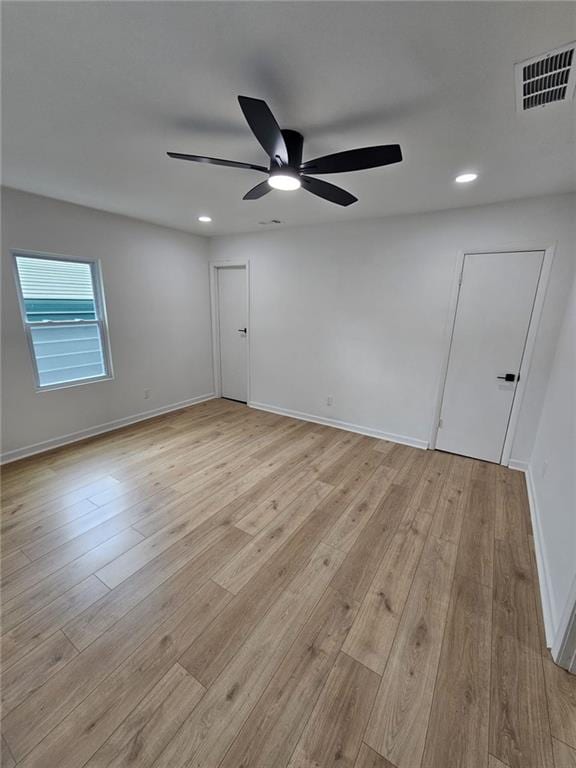 775 Lee Andrews Ave SE, Atlanta, GA 30315 - spare room featuring a ceiling fan, light wood-type flooring, recessed lighting, and baseboards