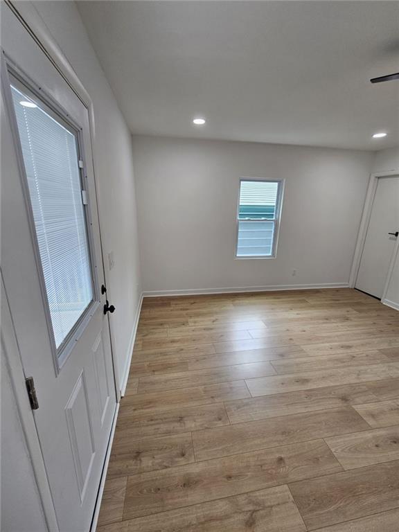 775 Lee Andrews Ave SE, Atlanta, GA 30315 - unfurnished room featuring light wood-style floors, recessed lighting, and baseboards