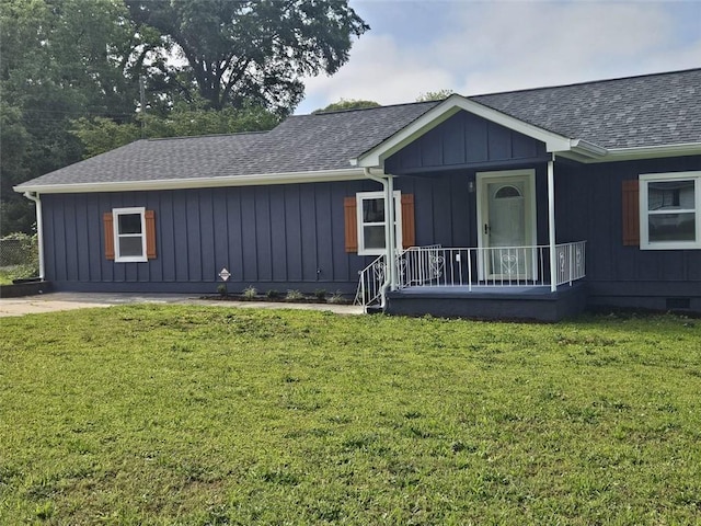 775 Lee Andrews Ave SE, Atlanta, GA 30315 - single story home featuring roof with shingles, a front lawn, a porch, and board and batten siding