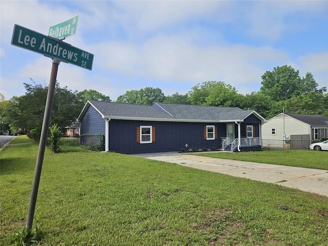 775 Lee Andrews Ave SE, Atlanta, GA 30315 - ranch-style home with a front lawn, a porch, and a shingled roof