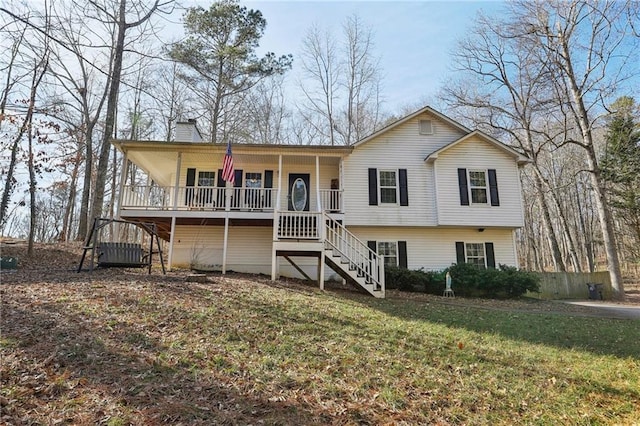 view of front of house with a front lawn and a porch