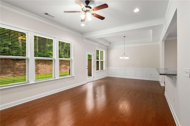 unfurnished room featuring crown molding, ceiling fan with notable chandelier, and dark hardwood / wood-style floors