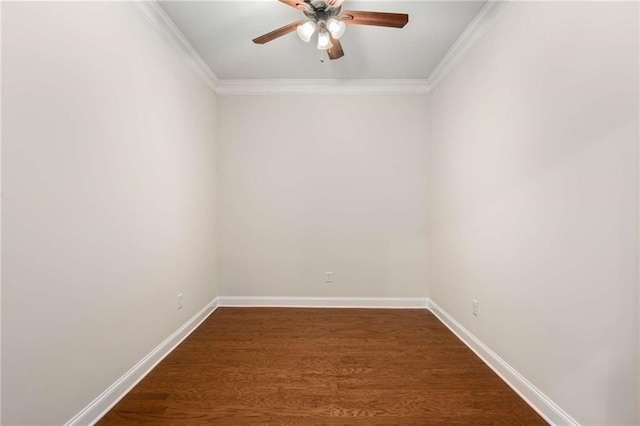 unfurnished room featuring dark hardwood / wood-style floors, ceiling fan, and crown molding