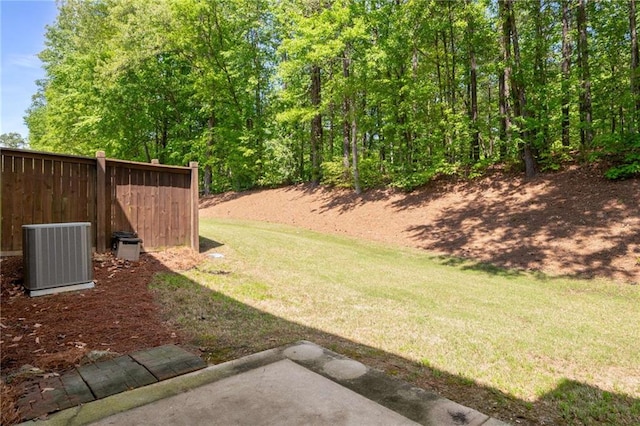 view of yard with central AC