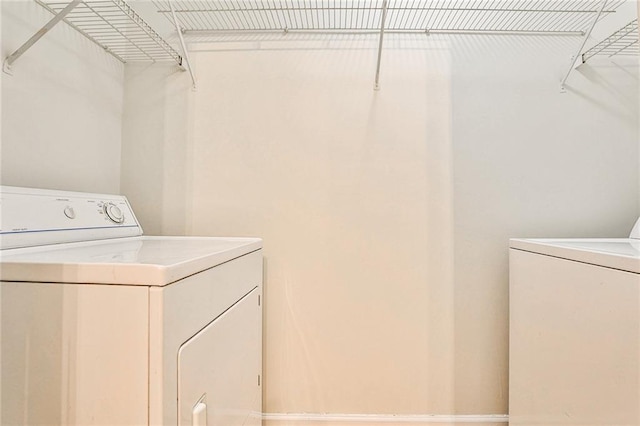 laundry area featuring independent washer and dryer