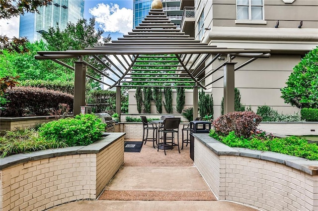 view of patio with a grill