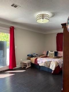 bedroom with dark hardwood / wood-style floors