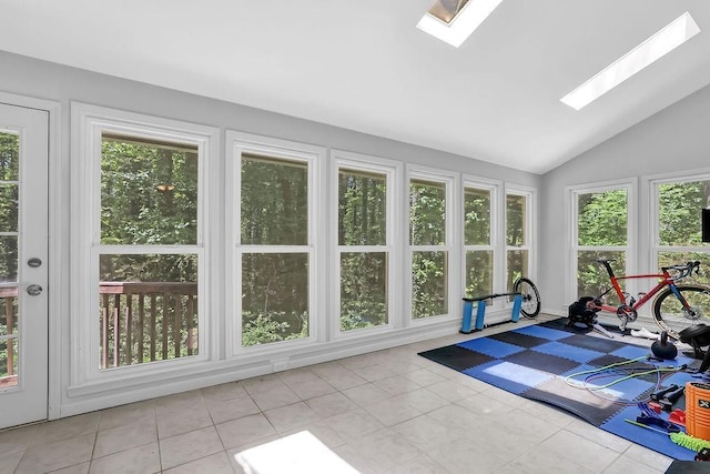 4066 Covered Bridge Rd SW, Smyrna, GA 30082 - sunroom with a skylight, vaulted ceiling, and tile patterned flooring