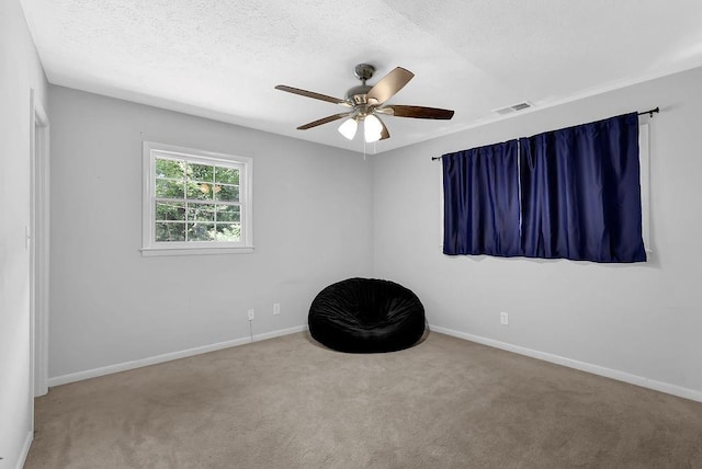 4066 Covered Bridge Rd SW, Smyrna, GA 30082 - carpeted spare room featuring ceiling fan, baseboards, and a textured ceiling