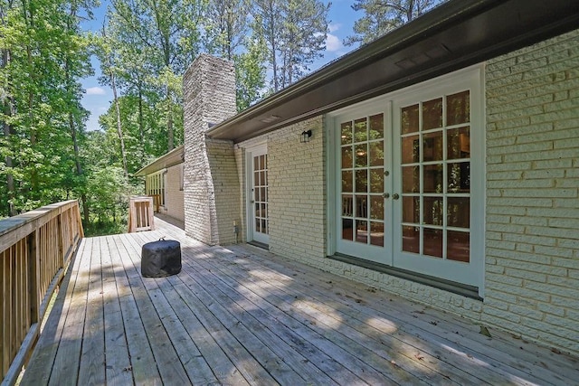 4066 Covered Bridge Rd SW, Smyrna, GA 30082 - wooden deck with french doors
